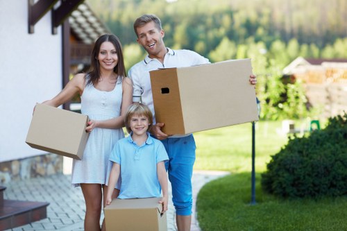 Local moving team handling furniture for an Earls Court move