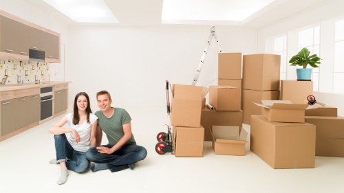 Office move coordination with labelled equipment and transport preparation